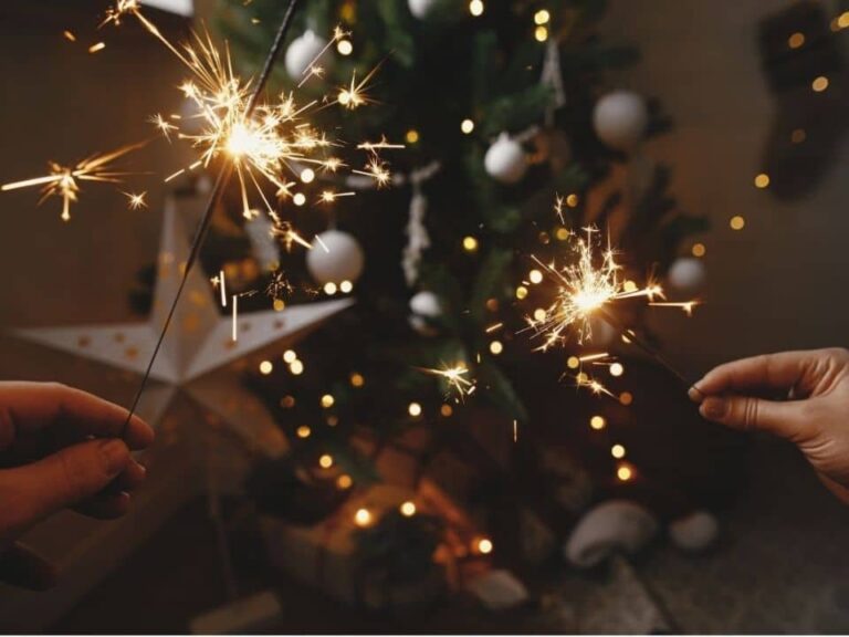 new-opportunity-to-achieve-your-dream-of-having-a-baby-couple-wishing-a-baby-with-flares-near-Christmas-tree